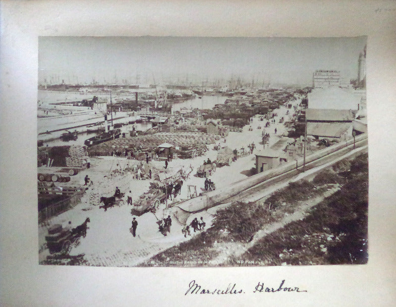 PHOTO ALBUM WITH 56 ORIGINAL PHOTOGRAPHS OF A VOYAGE FROM MARSEILLE TO CEYLON VIA THE SUEZ CANAL. Ca. 1890.